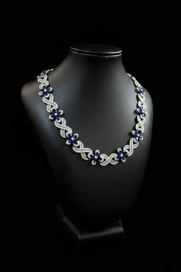 Cross xifinity blue necklace